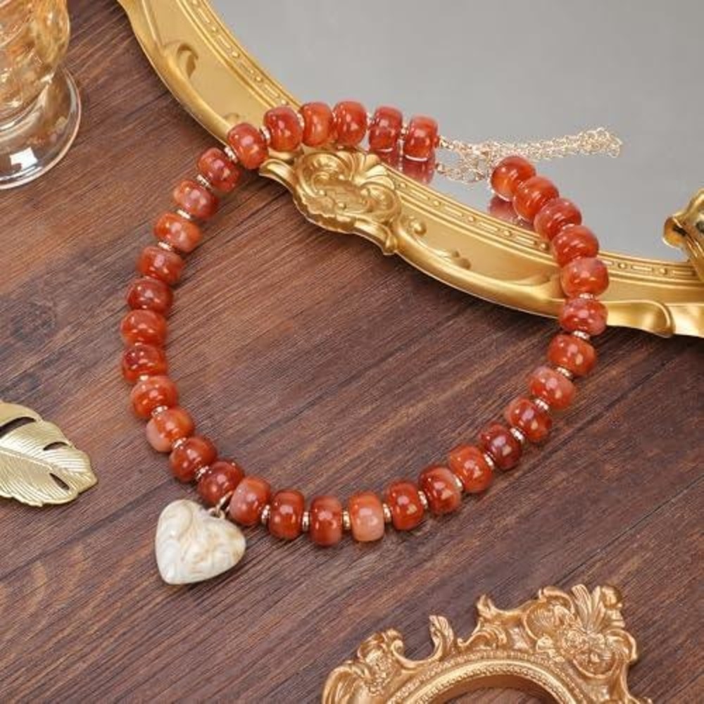 Burnt Orange Chunky Bead Necklace with White Marbled Heart Charm Gold Tone Clasp